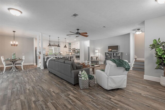 16 Wildwood Lake Dr, Huntsville, TX 77340 - living area featuring a ceiling fan, dark wood-type flooring, baseboards, stairs, and recessed lighting