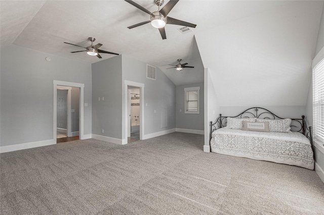 16 Wildwood Lake Dr, Huntsville, TX 77340 - carpeted bedroom featuring vaulted ceiling, baseboards, a ceiling fan, and ensuite bath
