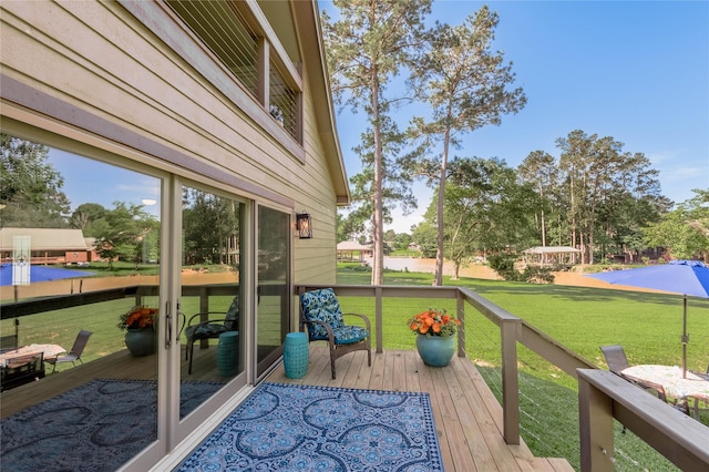 16 Wildwood Lake Dr, Huntsville, TX 77340 - wooden terrace with a lawn