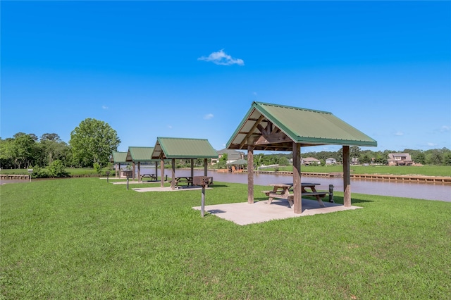 16 Wildwood Lake Dr, Huntsville, TX 77340 - surrounding community with a gazebo, a yard, and a water view