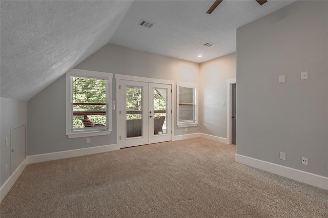 16 Wildwood Lake Dr, Huntsville, TX 77340 - bonus room with ceiling fan, lofted ceiling, french doors, baseboards, and carpet