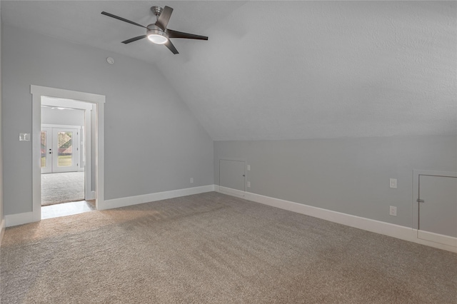 16 Wildwood Lake Dr, Huntsville, TX 77340 - bonus room featuring lofted ceiling, light colored carpet, ceiling fan, and baseboards