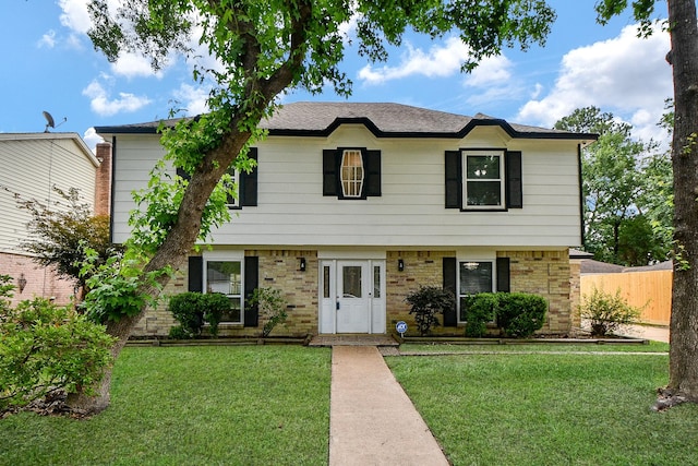 4719 Theall Rd, Houston, TX 77066 - colonial house featuring brick siding