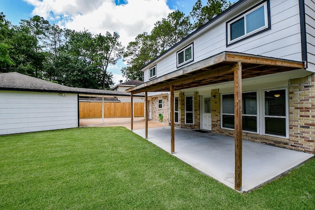 4719 Theall Rd, Houston, TX 77066 - back of property with a patio area and brick siding