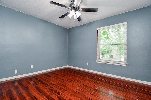 4719 Theall Rd, Houston, TX 77066 - spare room featuring wood finished floors, baseboards, and ceiling fan