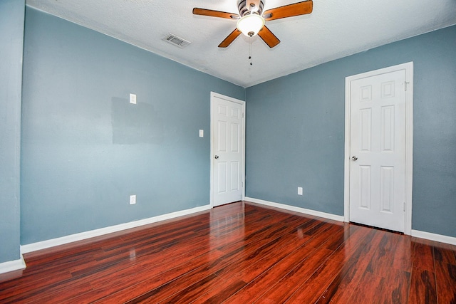 4719 Theall Rd, Houston, TX 77066 - spare room with ceiling fan, baseboards, and wood finished floors