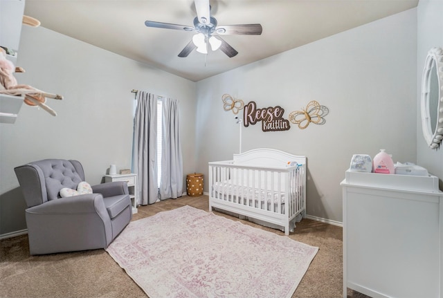 211 Clementine Ct, Montgomery, TX 77316 - bedroom featuring a crib, light carpet, and ceiling fan