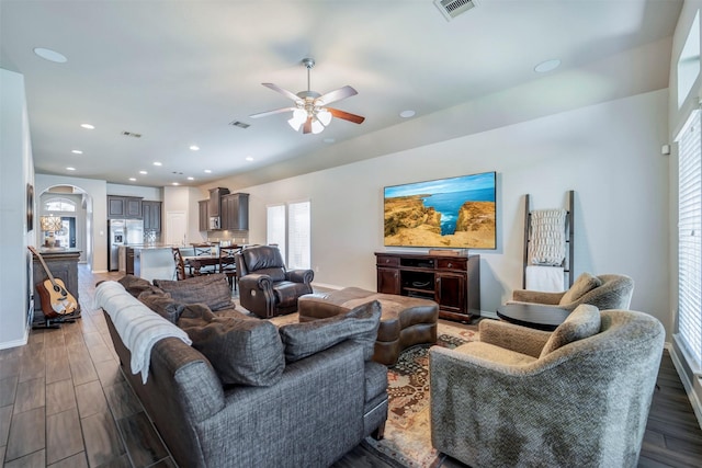 211 Clementine Ct, Montgomery, TX 77316 - living area featuring a ceiling fan, wood finished floors, plenty of natural light, baseboards, and recessed lighting