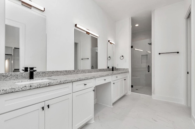 5609 Savyon Dr, Houston, TX 77091 - full bathroom featuring a stall shower, marble look tiles, double vanity, recessed lighting, and baseboards