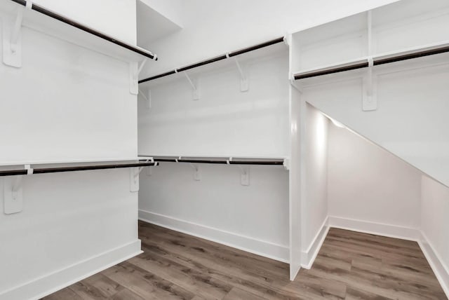 5609 Savyon Dr, Houston, TX 77091 - walk in closet with wood finished floors