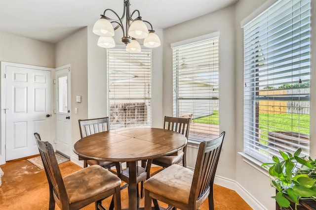 6207 Presidio Canyon Dr, Katy, TX 77450 - dining room with a chandelier and baseboards