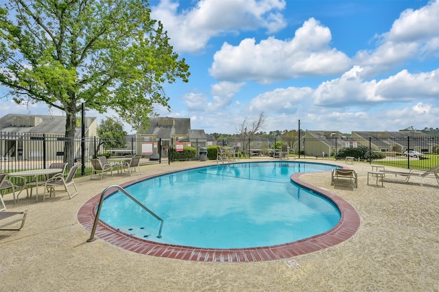111 Capetown Way, Conroe, TX 77356 - community pool featuring a residential view and a patio area