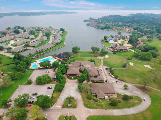 111 Capetown Way, Conroe, TX 77356 - view of property location with a large body of water, nearby suburban area, and a pool