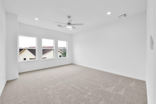 111 Capetown Way, Conroe, TX 77356 - empty room featuring carpet floors, baseboards, a ceiling fan, and recessed lighting