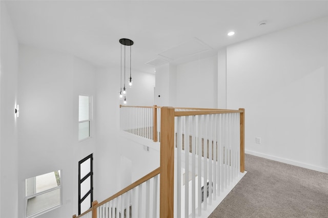 111 Capetown Way, Conroe, TX 77356 - hall with attic access, carpet flooring, an upstairs landing, baseboards, and recessed lighting