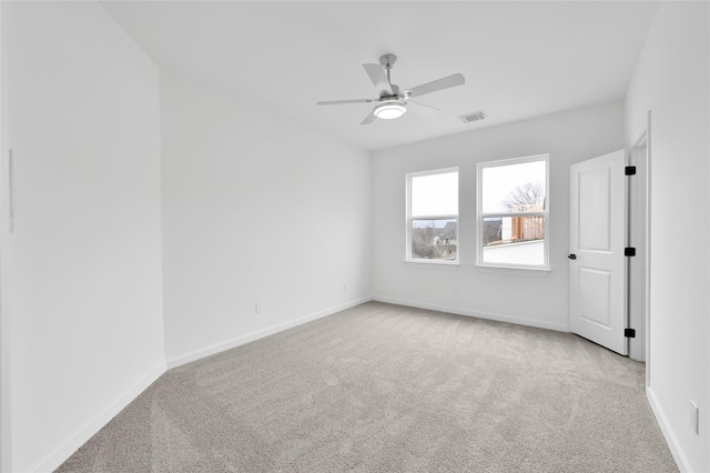111 Capetown Way, Conroe, TX 77356 - spare room with carpet, a ceiling fan, and baseboards