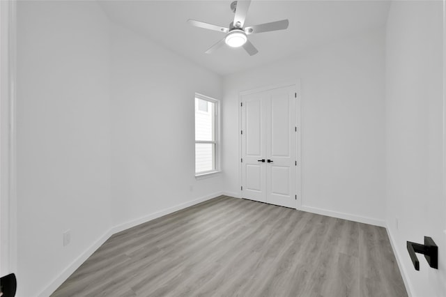 111 Capetown Way, Conroe, TX 77356 - spare room featuring wood finished floors, ceiling fan, and baseboards