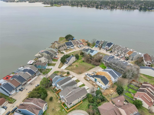 111 Capetown Way, Conroe, TX 77356 - aerial overview of property's location featuring nearby suburban area and a nearby body of water
