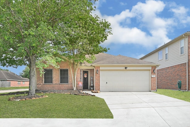 2201 Piney Wood Dr, Deer Park, TX 77536 - view of front of house featuring a garage, driveway, a front lawn, and brick siding