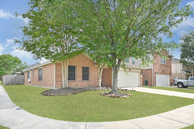 2201 Piney Wood Dr, Deer Park, TX 77536 - view of front facade with concrete driveway, an attached garage, and brick siding