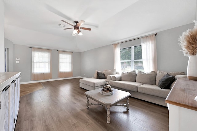 2201 Piney Wood Dr, Deer Park, TX 77536 - living area featuring ceiling fan, healthy amount of natural light, wood finished floors, and baseboards
