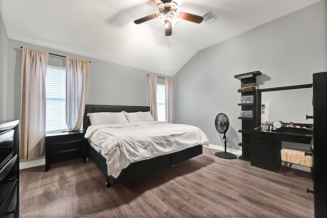 2201 Piney Wood Dr, Deer Park, TX 77536 - bedroom with lofted ceiling, wood finished floors, ceiling fan, and baseboards
