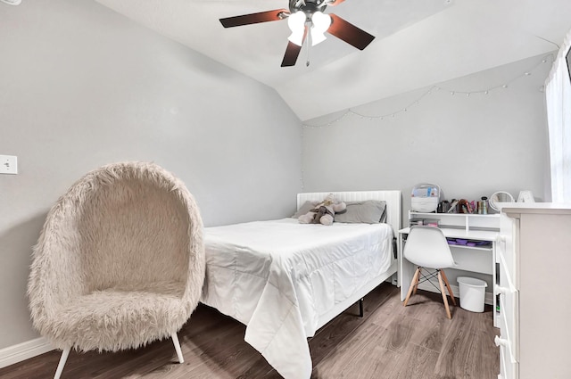 2201 Piney Wood Dr, Deer Park, TX 77536 - bedroom with wood finished floors, lofted ceiling, and a ceiling fan