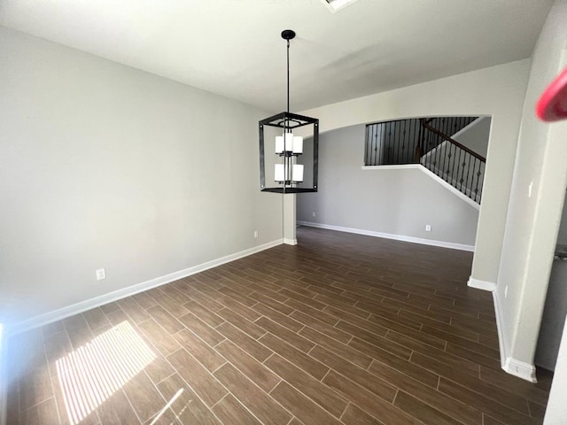 4923 Lacebark Pine Trl, Rosenberg, TX 77471 - unfurnished dining area featuring baseboards, stairs, and dark wood-style floors