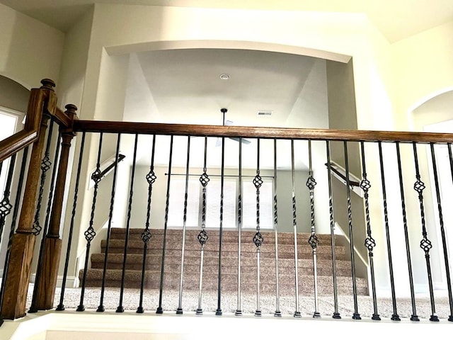4923 Lacebark Pine Trl, Rosenberg, TX 77471 - staircase featuring arched walkways