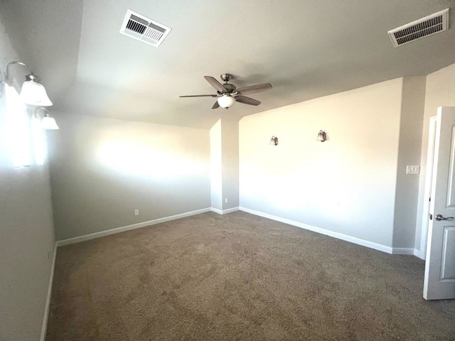 4923 Lacebark Pine Trl, Rosenberg, TX 77471 - carpeted empty room featuring ceiling fan, vaulted ceiling, and baseboards