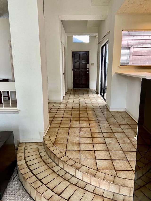 1903 Barons Gln, Sugar Land, TX 77478 - corridor with light tile patterned floors and baseboards