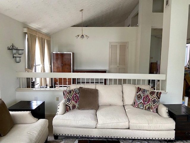 1903 Barons Gln, Sugar Land, TX 77478 - carpeted living area featuring lofted ceiling, a chandelier, and a textured ceiling
