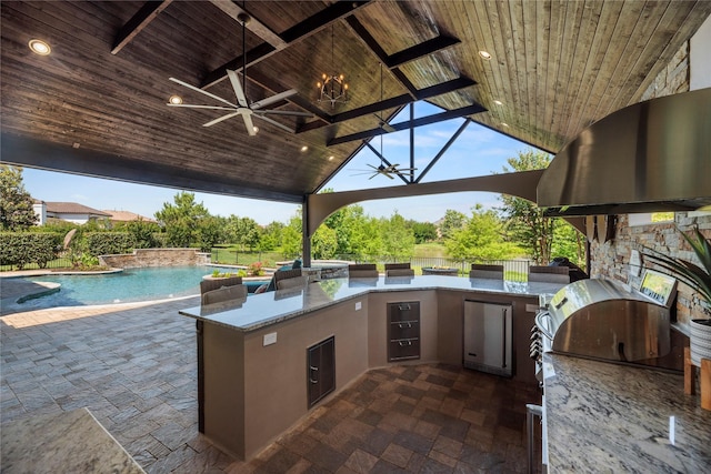 5518 Fleming Rock Ln, Fulshear, TX 77441 - view of patio featuring a ceiling fan, an outdoor kitchen, a gazebo, an outdoor pool, and fence