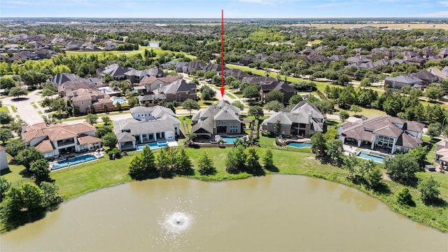 5518 Fleming Rock Ln, Fulshear, TX 77441 - aerial view of residential area with a nearby body of water and a pool area