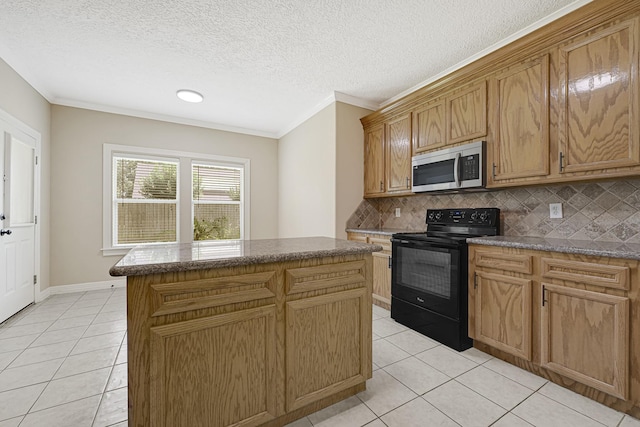 1207 S Diamondhead Blvd, Crosby, TX 77532 - kitchen featuring stainless steel microwave, black electric range oven, light tile patterned floors, decorative backsplash, and ornamental molding