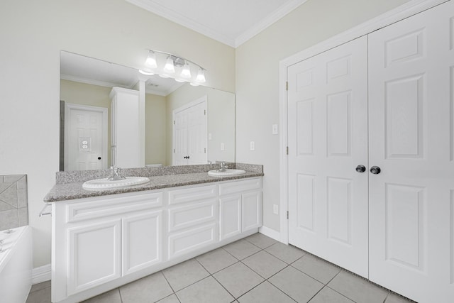 1207 S Diamondhead Blvd, Crosby, TX 77532 - bathroom with double vanity, ornamental molding, tile patterned floors, a bath, and baseboards