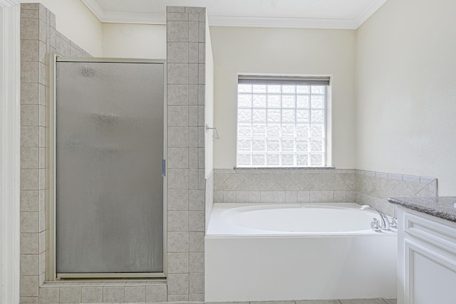1207 S Diamondhead Blvd, Crosby, TX 77532 - bathroom featuring vanity, a shower stall, a garden tub, and ornamental molding