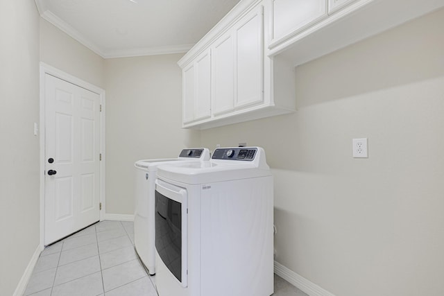 1207 S Diamondhead Blvd, Crosby, TX 77532 - laundry area with independent washer and dryer, cabinet space, ornamental molding, baseboards, and light tile patterned floors