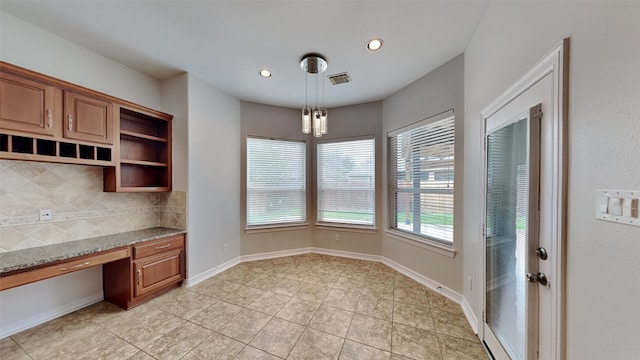 11111 Monte Rosa Ct, Richmond, TX 77406 - unfurnished dining area with light tile patterned flooring, recessed lighting, and baseboards