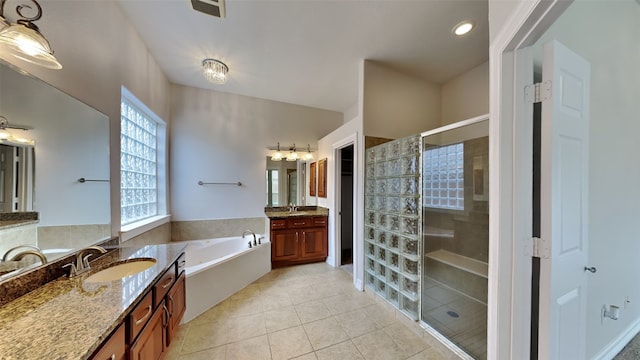 11111 Monte Rosa Ct, Richmond, TX 77406 - full bath with a stall shower, a garden tub, tile patterned floors, and two vanities