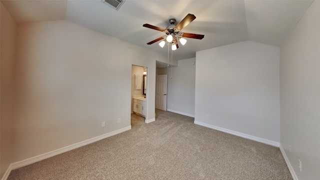 11111 Monte Rosa Ct, Richmond, TX 77406 - unfurnished bedroom with vaulted ceiling, light colored carpet, baseboards, ensuite bathroom, and ceiling fan
