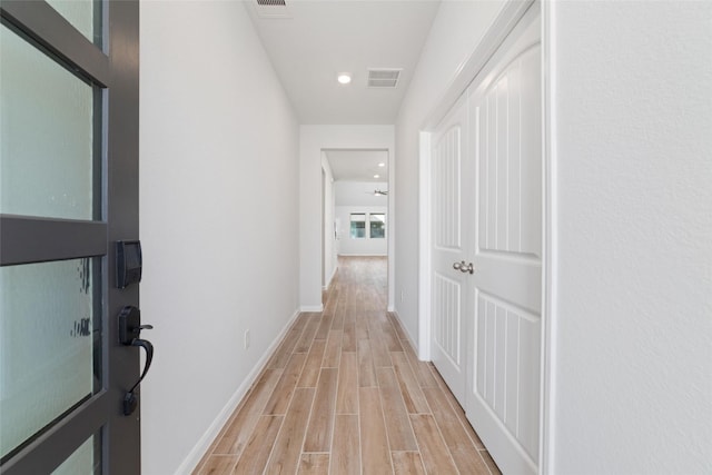 19806 Lone Paddock Cir, Tomball, TX 77377 - hallway with light wood-style flooring, baseboards, and recessed lighting