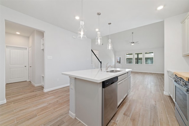 19806 Lone Paddock Cir, Tomball, TX 77377 - kitchen with a sink, appliances with stainless steel finishes, light wood-type flooring, a ceiling fan, and recessed lighting