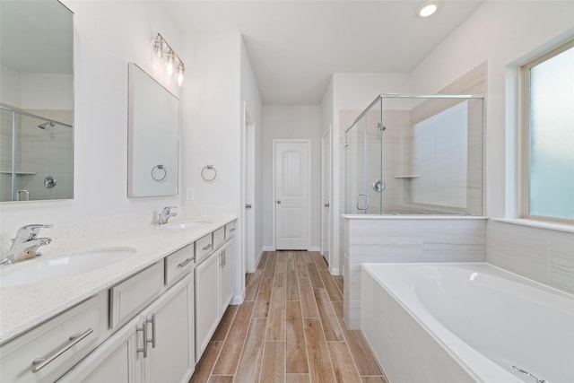 19806 Lone Paddock Cir, Tomball, TX 77377 - full bath with a shower stall, healthy amount of natural light, a garden tub, and double vanity