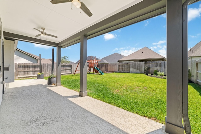 19806 Lone Paddock Cir, Tomball, TX 77377 - view of yard with a ceiling fan, a patio, a playground, and a residential view