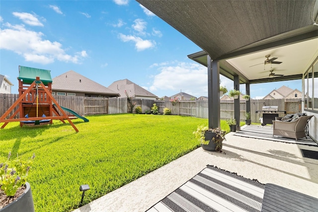 19806 Lone Paddock Cir, Tomball, TX 77377 - view of yard featuring a playground, a patio area, a residential view, and a ceiling fan