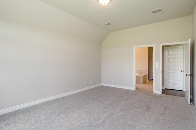 1639 Rosedale Dr, Missouri City, TX 77459 - unfurnished bedroom with carpet, baseboards, and lofted ceiling