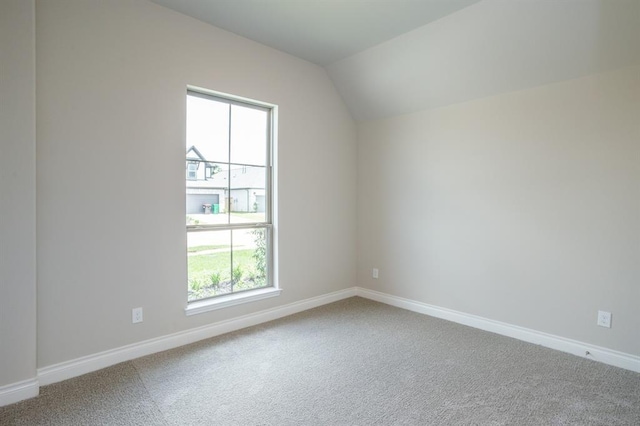 1639 Rosedale Dr, Missouri City, TX 77459 - carpeted empty room with baseboards and lofted ceiling