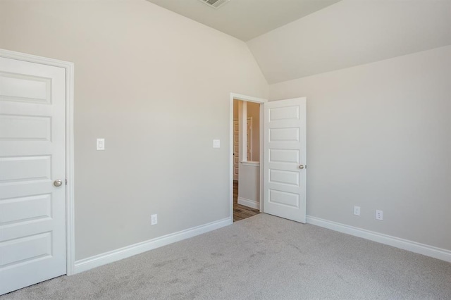1639 Rosedale Dr, Missouri City, TX 77459 - carpeted spare room featuring vaulted ceiling and baseboards