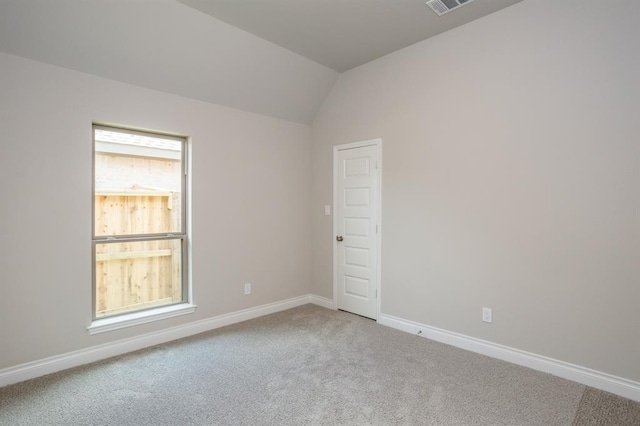 1639 Rosedale Dr, Missouri City, TX 77459 - carpeted empty room featuring baseboards and lofted ceiling